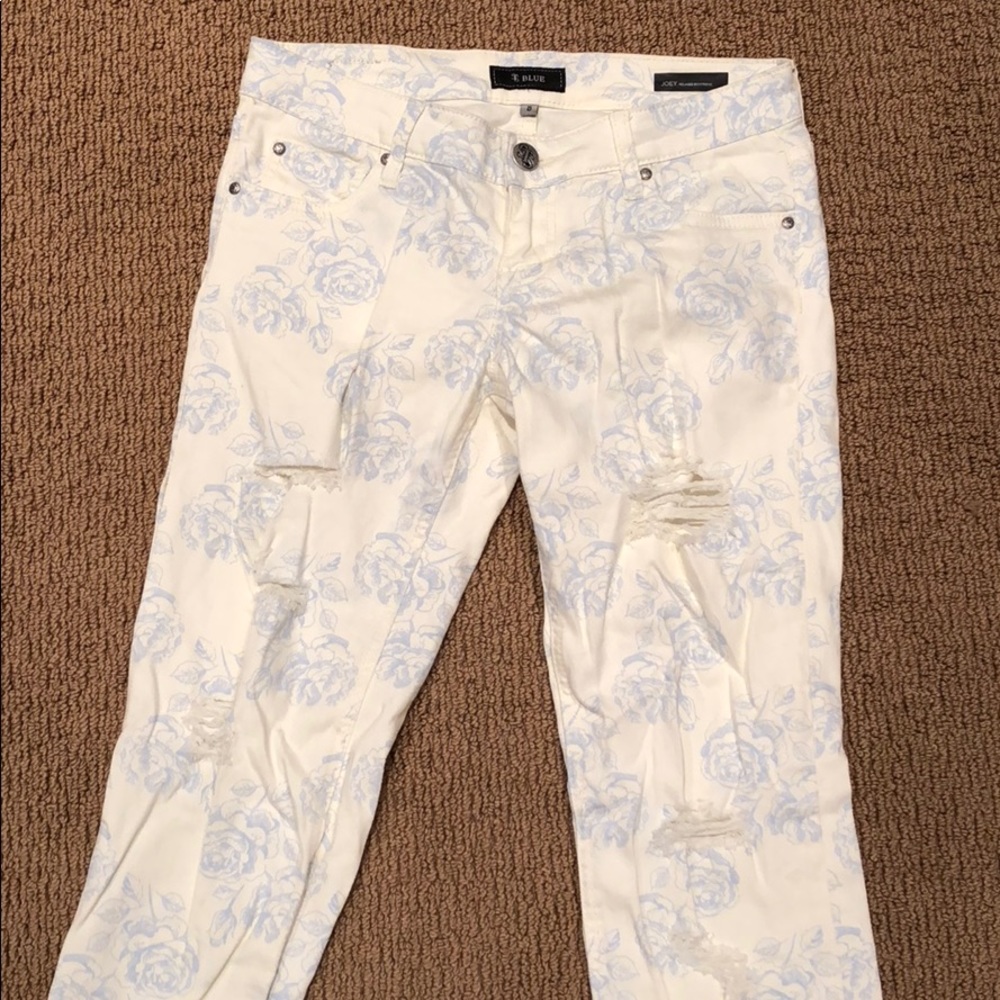 Distressed floral jeans